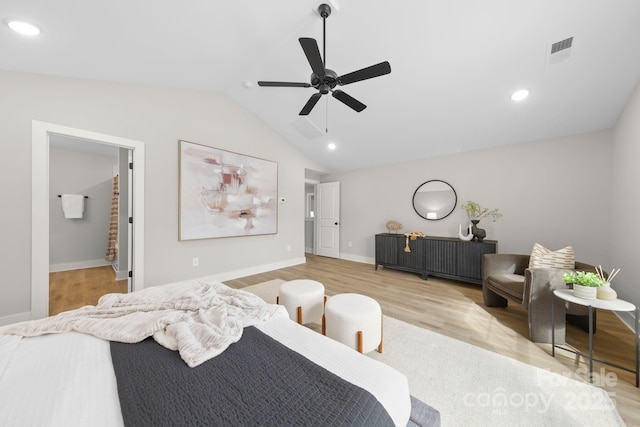 bedroom featuring vaulted ceiling, ceiling fan, and light wood-type flooring