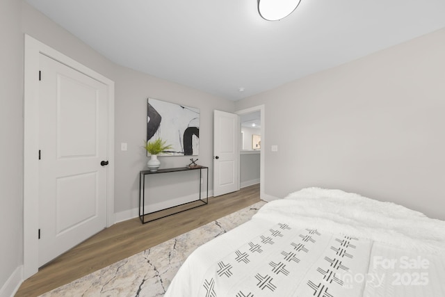 bedroom featuring light wood-type flooring