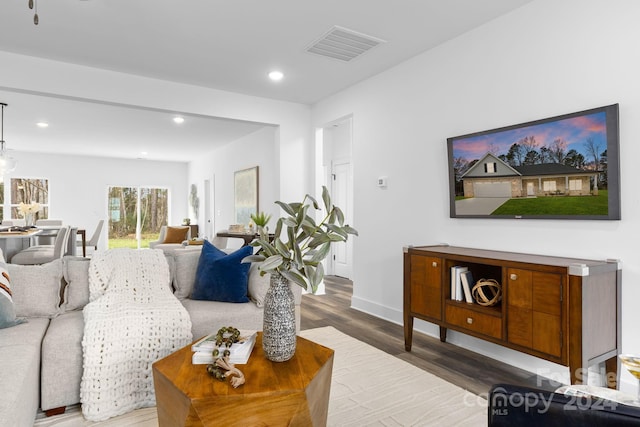 living room with dark wood-type flooring