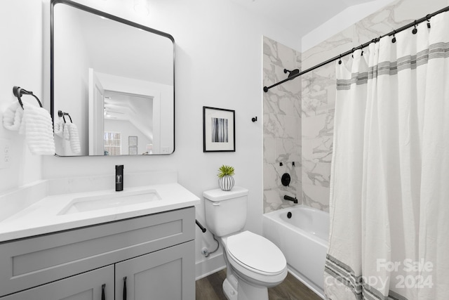 full bathroom featuring hardwood / wood-style floors, vanity, shower / bath combo, and toilet