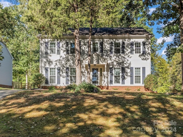 colonial house with a front lawn