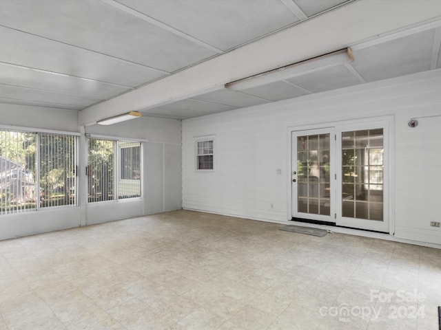 view of unfurnished sunroom