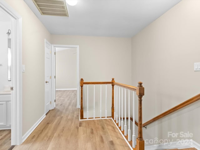 corridor featuring light hardwood / wood-style flooring