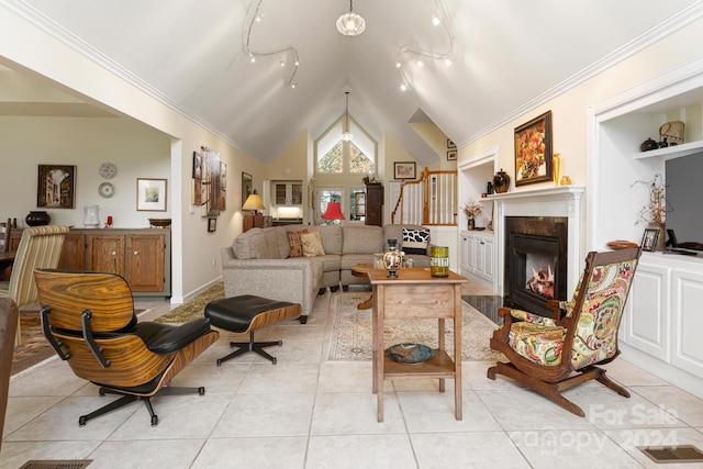 living area with lofted ceiling, track lighting, a high end fireplace, light tile patterned flooring, and crown molding