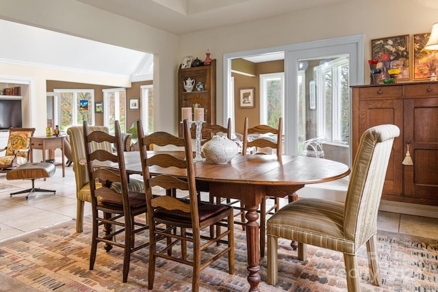 150 Overlook Dr, Flat Rock, NC 28731 - dining area with light tile patterned floors and lofted ceiling
