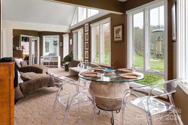 sunroom / solarium with lofted ceiling