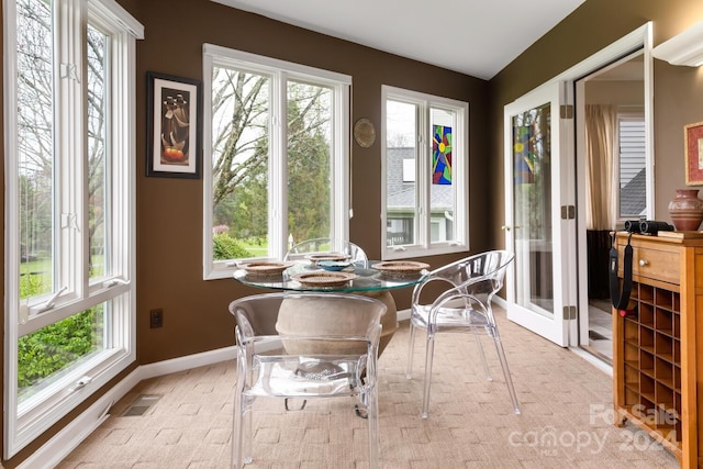 sunroom featuring plenty of natural light