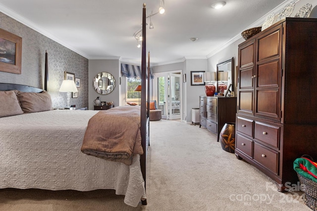 carpeted bedroom featuring crown molding