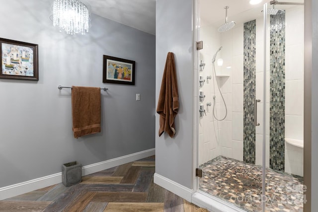 150 Overlook Dr, Flat Rock, NC 28731 - full bath featuring a shower stall, baseboards, and a chandelier