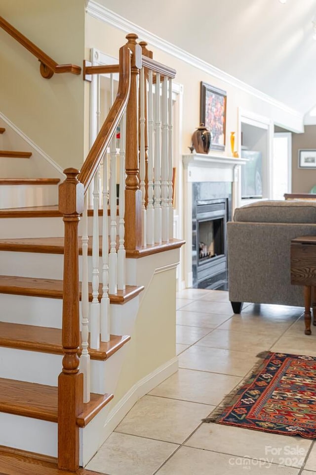 150 Overlook Dr, Flat Rock, NC 28731 - stairs featuring tile patterned floors, crown molding, a fireplace, and baseboards