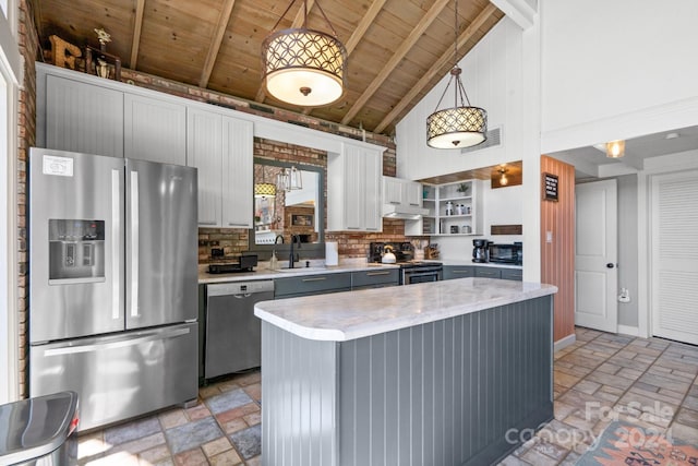 kitchen with backsplash, high vaulted ceiling, pendant lighting, gray cabinets, and stainless steel appliances