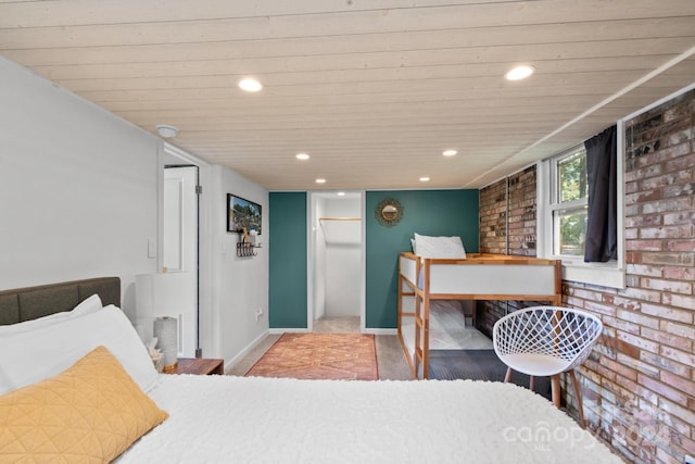 364 Catalina Dr, Mooresville, NC 28117 - tiled bedroom with recessed lighting, baseboards, brick wall, and wooden ceiling