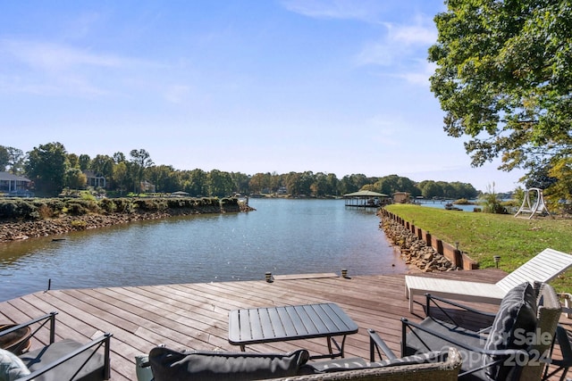 dock area with a water view