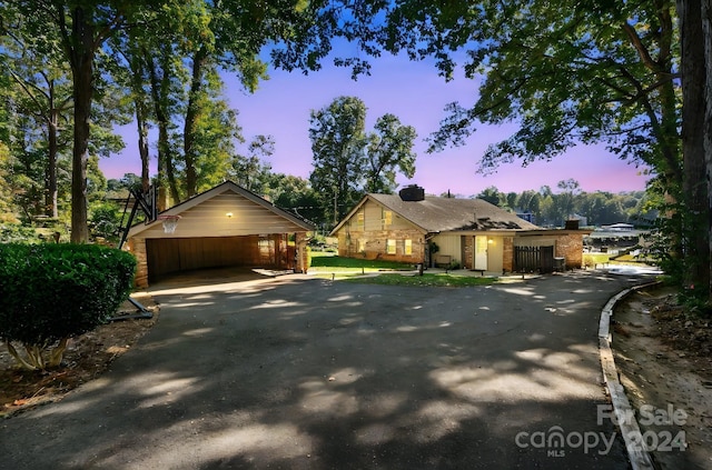 364 Catalina Dr, Mooresville, NC 28117 - view of front of house featuring a detached carport, a chimney, aphalt driveway, and brick siding