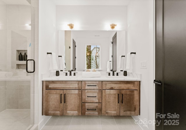 bathroom with tile patterned flooring, walk in shower, and vanity