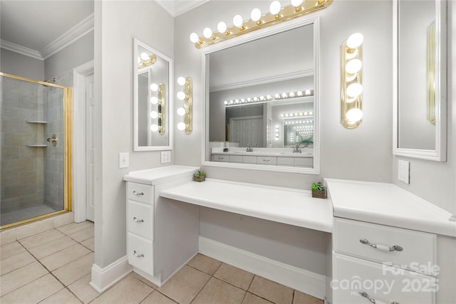 bathroom featuring vanity, tile patterned floors, ornamental molding, and a shower with door