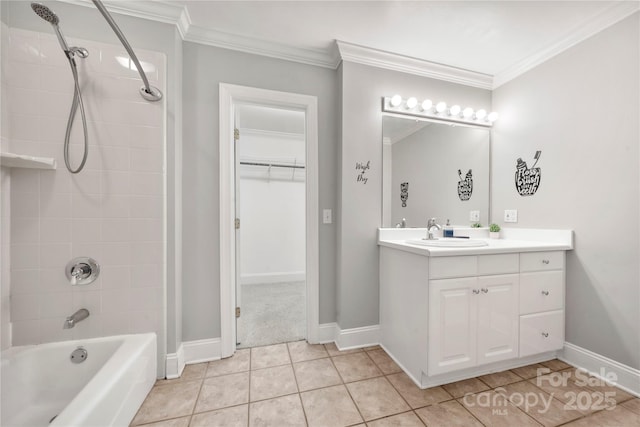 bathroom featuring tile patterned flooring, vanity, tiled shower / bath combo, and ornamental molding