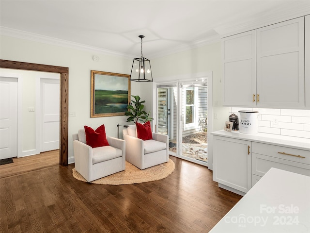 interior space featuring crown molding and dark hardwood / wood-style floors