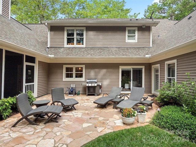 view of patio featuring a grill