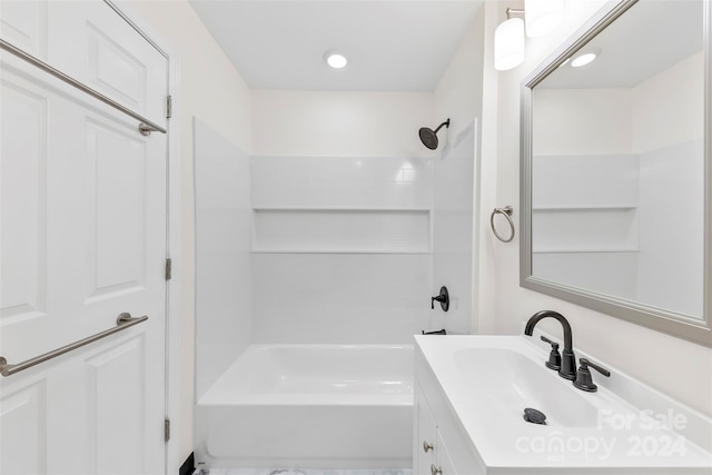 bathroom with vanity and shower / tub combination