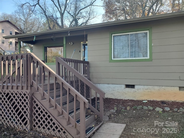 exterior space featuring a wooden deck