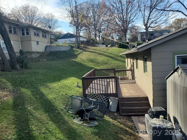 view of yard featuring a wooden deck