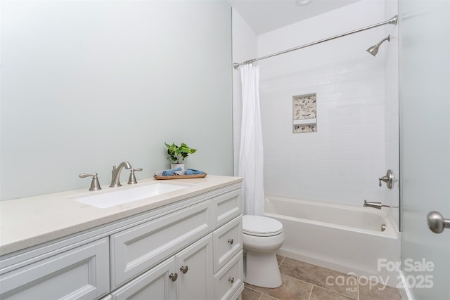 bathroom with shower / bath combo, tile patterned flooring, vanity, and toilet