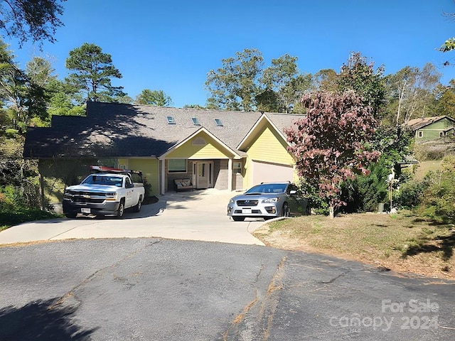 view of front of home with a garage