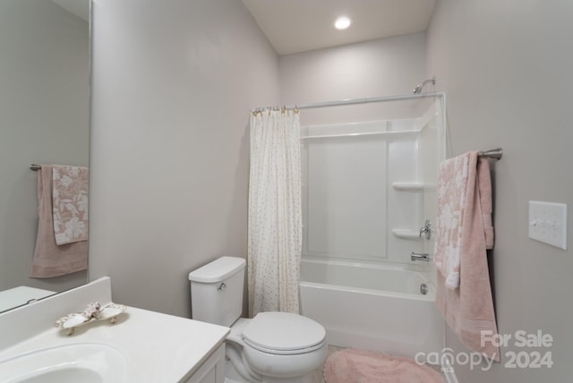 full bathroom with vanity, toilet, and shower / tub combo