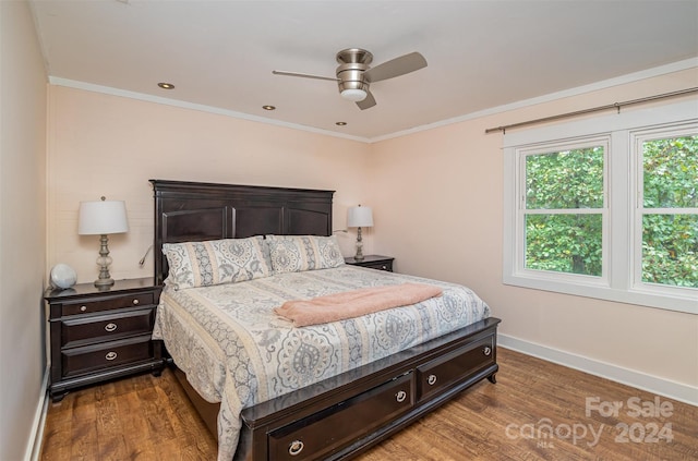 bedroom with ceiling fan, wood-type flooring, and ornamental molding