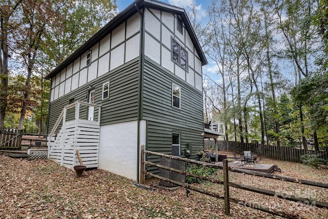 view of home's exterior with a patio area