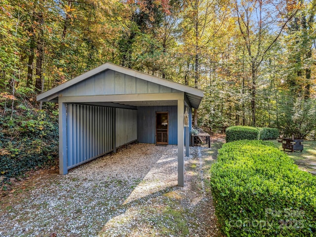 garage featuring a carport