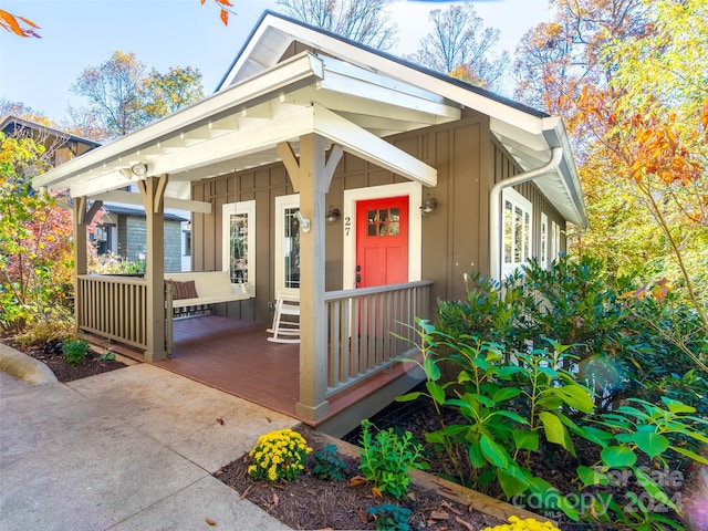 entrance to property with a porch