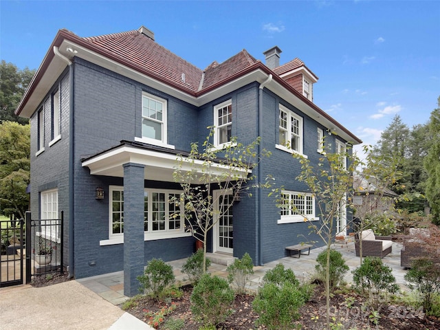 view of front of home featuring a patio area