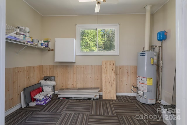 utility room with water heater