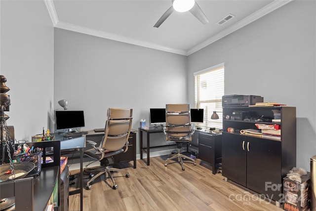 office area featuring light hardwood / wood-style floors, ornamental molding, and ceiling fan