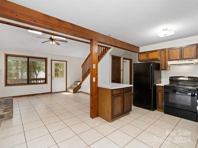 kitchen featuring black appliances, a textured ceiling, ceiling fan, beamed ceiling, and light tile patterned floors