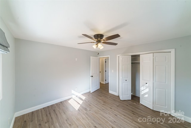 unfurnished bedroom featuring a closet, ceiling fan, and light hardwood / wood-style floors