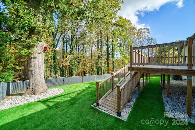 view of yard featuring a deck