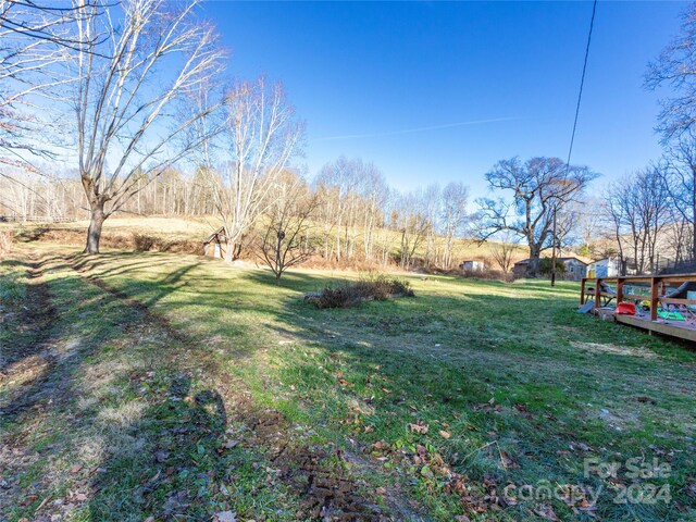 view of yard with a deck