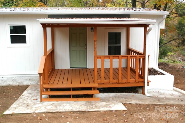 entrance to property with a porch