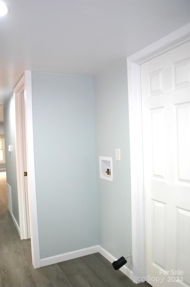 washroom with washer hookup and dark hardwood / wood-style floors