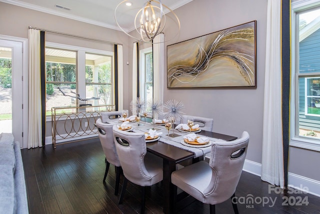 dining room with ornamental molding, a wealth of natural light, and dark hardwood / wood-style flooring