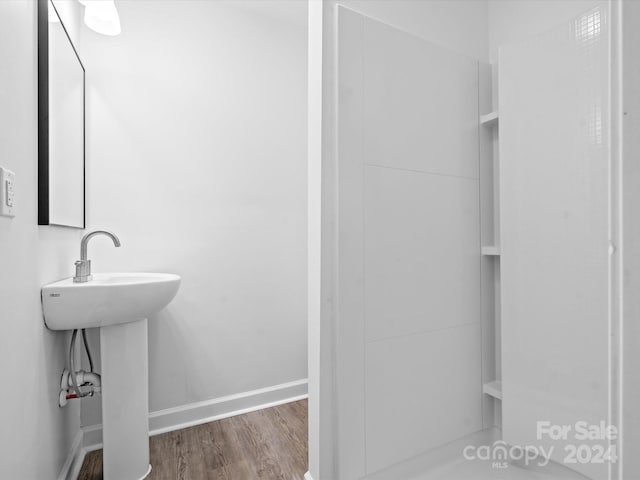 bathroom featuring hardwood / wood-style flooring and sink