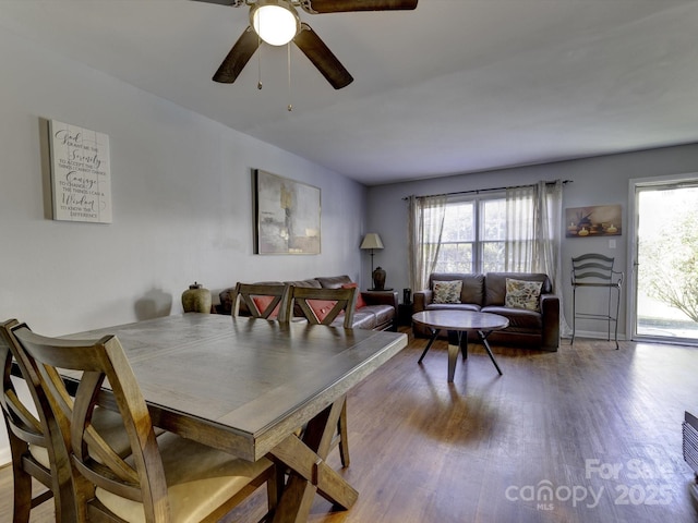 dining room with wood-type flooring, ceiling fan, and plenty of natural light