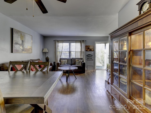 dining room with ceiling fan and wood-type flooring