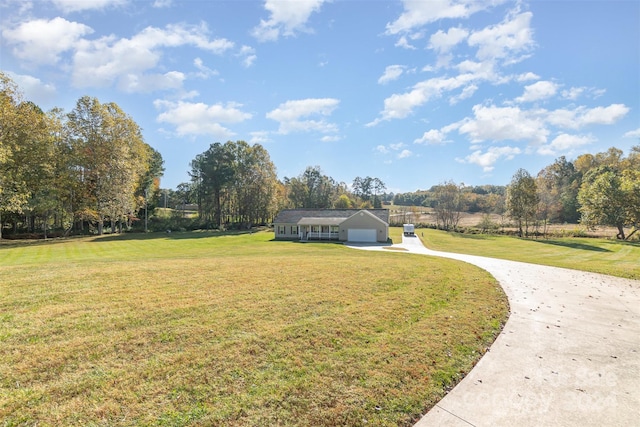 view of yard featuring a garage