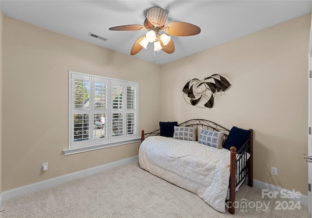 bedroom featuring ceiling fan