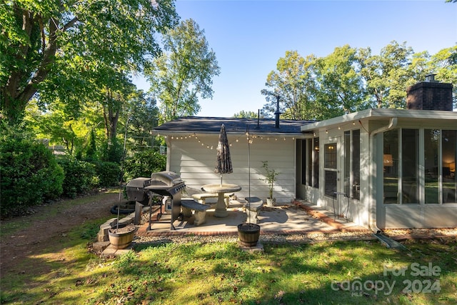 rear view of house with a patio area