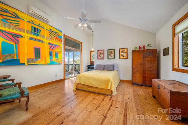 bedroom featuring ceiling fan, high vaulted ceiling, a wall mounted AC, and light wood-type flooring